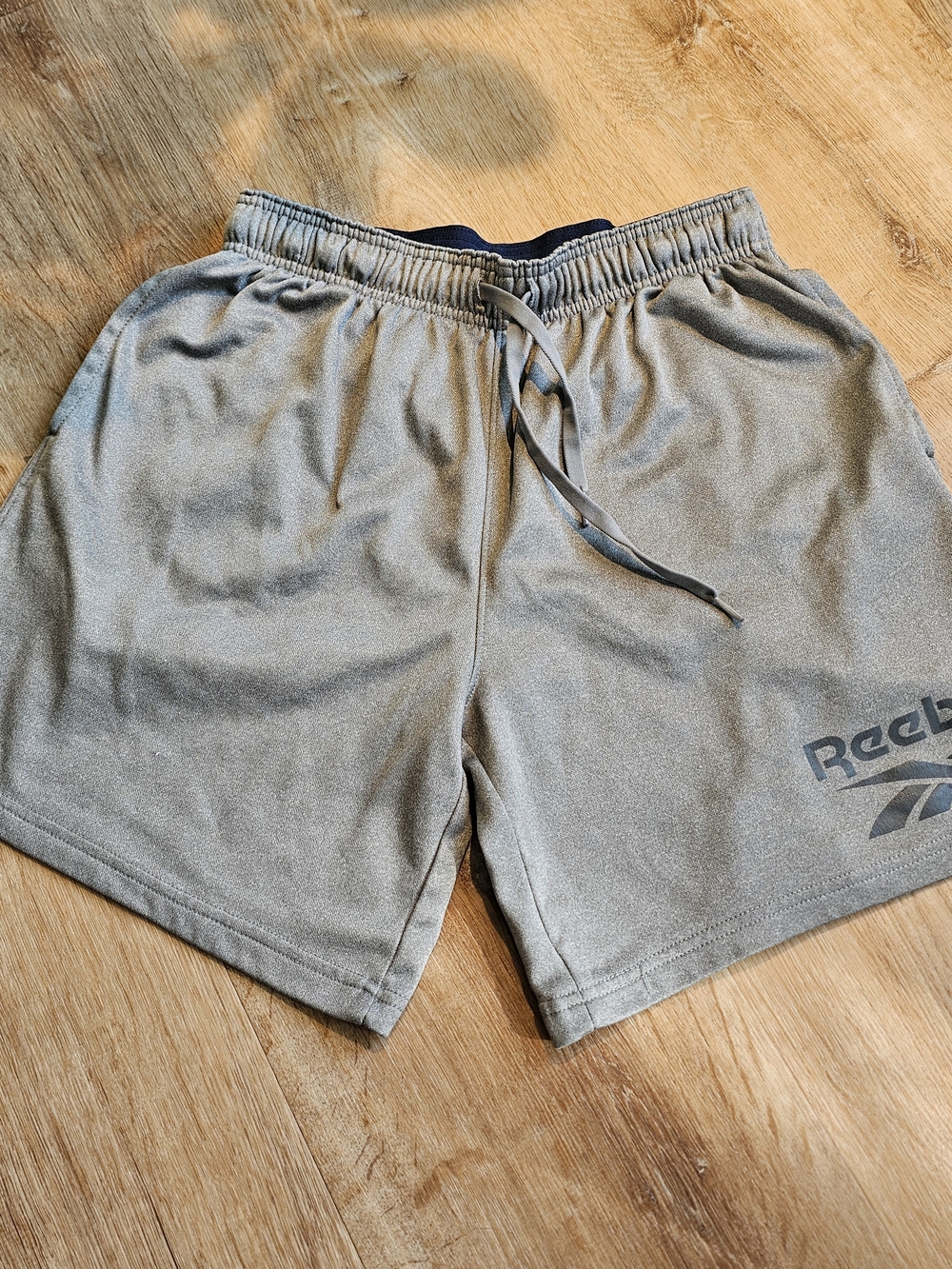 men's Reebok performance athletic shorts in heather gray  size small